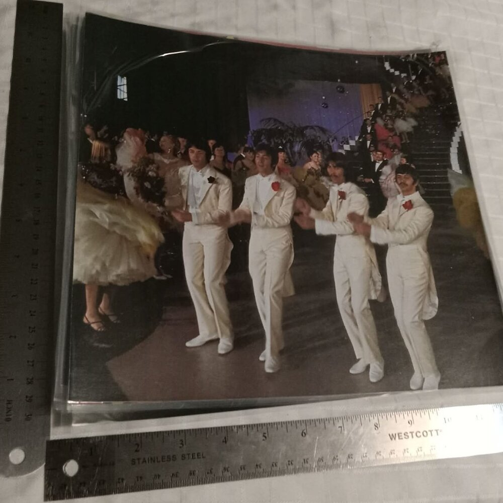 No3 : Ten (10) laminated in plastic posters featuring the Beatles